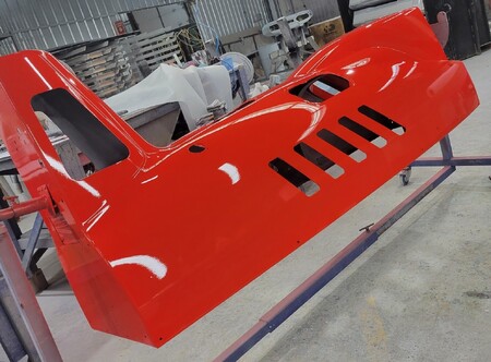Carbon fiber fuselage painted in red